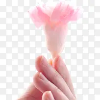 创意摄影手拿粉红色的花朵-空若网 创意摄影手拿粉红色的花朵-空若网