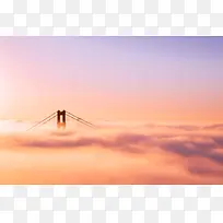 橙色云雾中的大桥海报背景-空若网 橙色云雾中的大桥海报背景-空若网