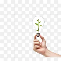 创意电器手拿植物灯泡装饰图案-空若网 创意电器手拿植物灯泡装饰图案-空若网