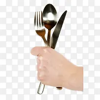 拿着西餐具的手-空若网 拿着西餐具的手-空若网