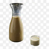 瓶装热奶茶和小杯子-空若网 瓶装热奶茶和小杯子-空若网