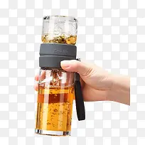 手拿玻璃保温杯-空若网 手拿玻璃保温杯-空若网