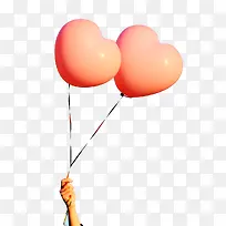手拿爱心汽球-空若网 手拿爱心汽球-空若网